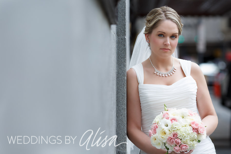 omni-william-penn-hotel-pittsburgh-wedding-photographer-21 Bride waiting for the limo to arrive outside Omni William Penn for wedding